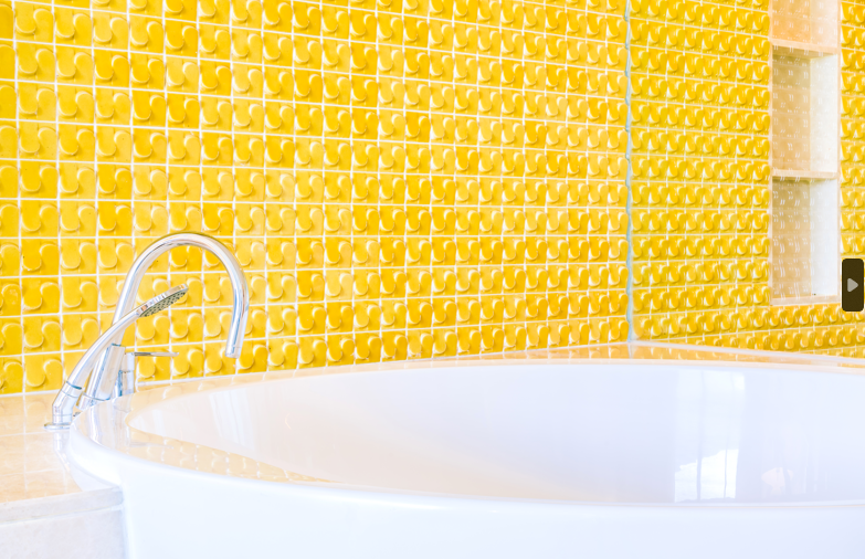 yellow tiled bathroom